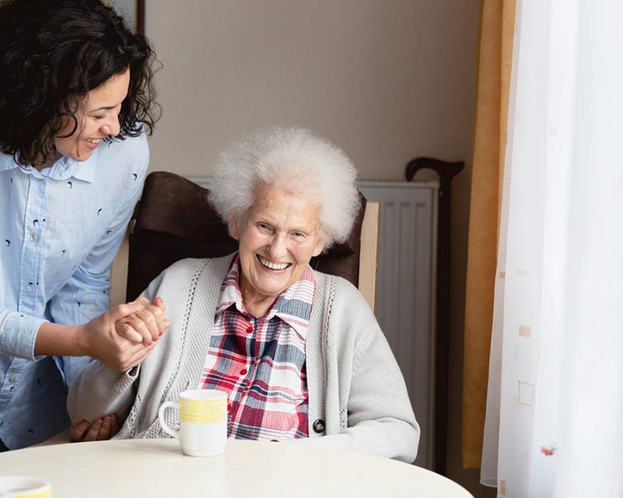 Senior woman getting care and assistance