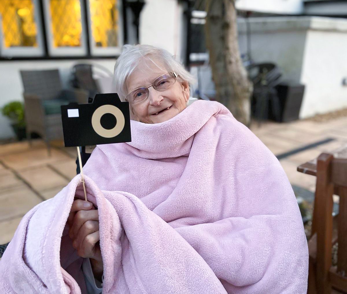 Luton care home resident enjoying the outdoor cinema experience