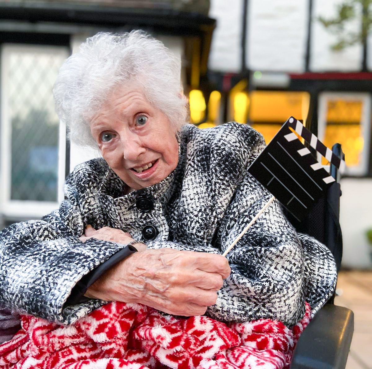 Luton care home resident enjoying the outdoor cinema experience