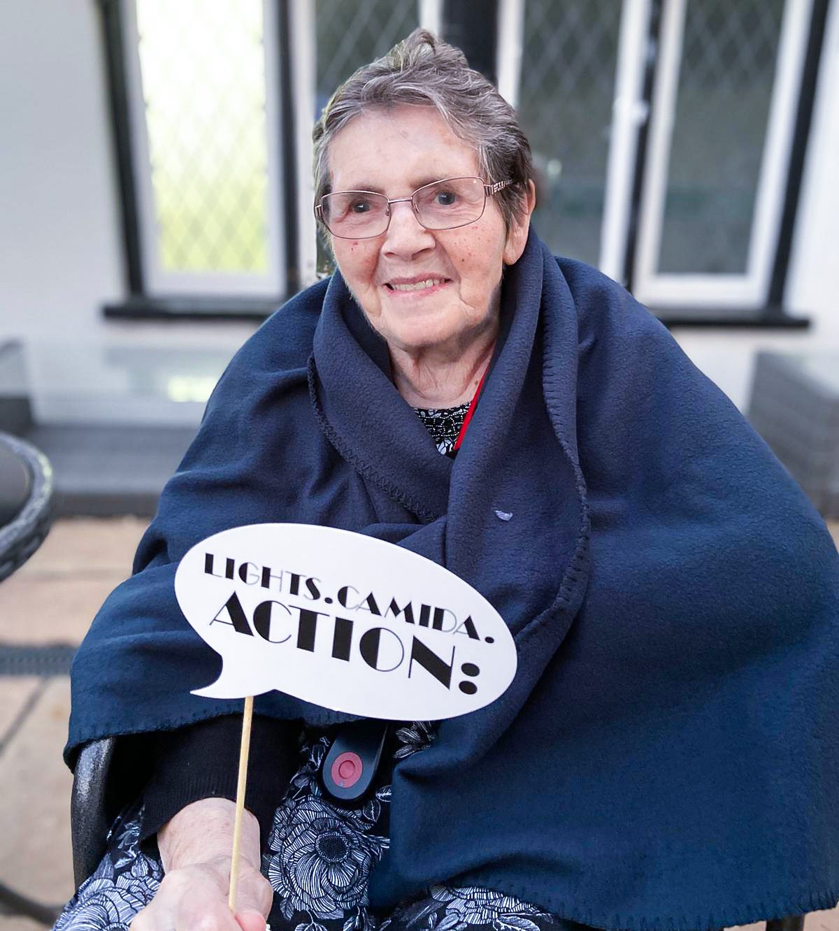 Luton care home resident enjoying the outdoor cinema experience