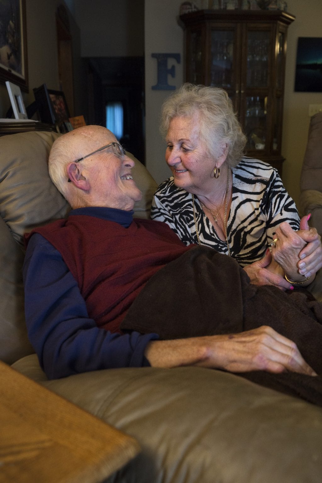 Tender moment between senior couples