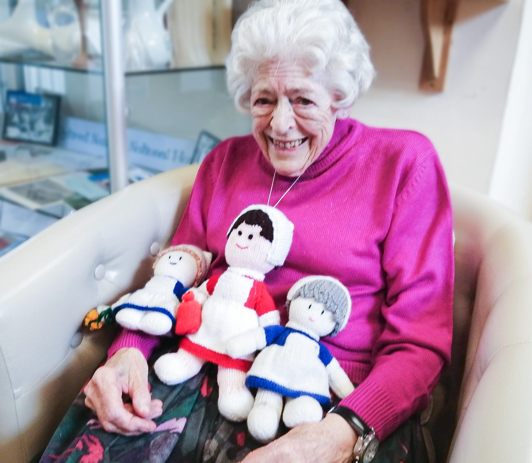 RNNH care home resident with nurse dolls on International Nurses Day