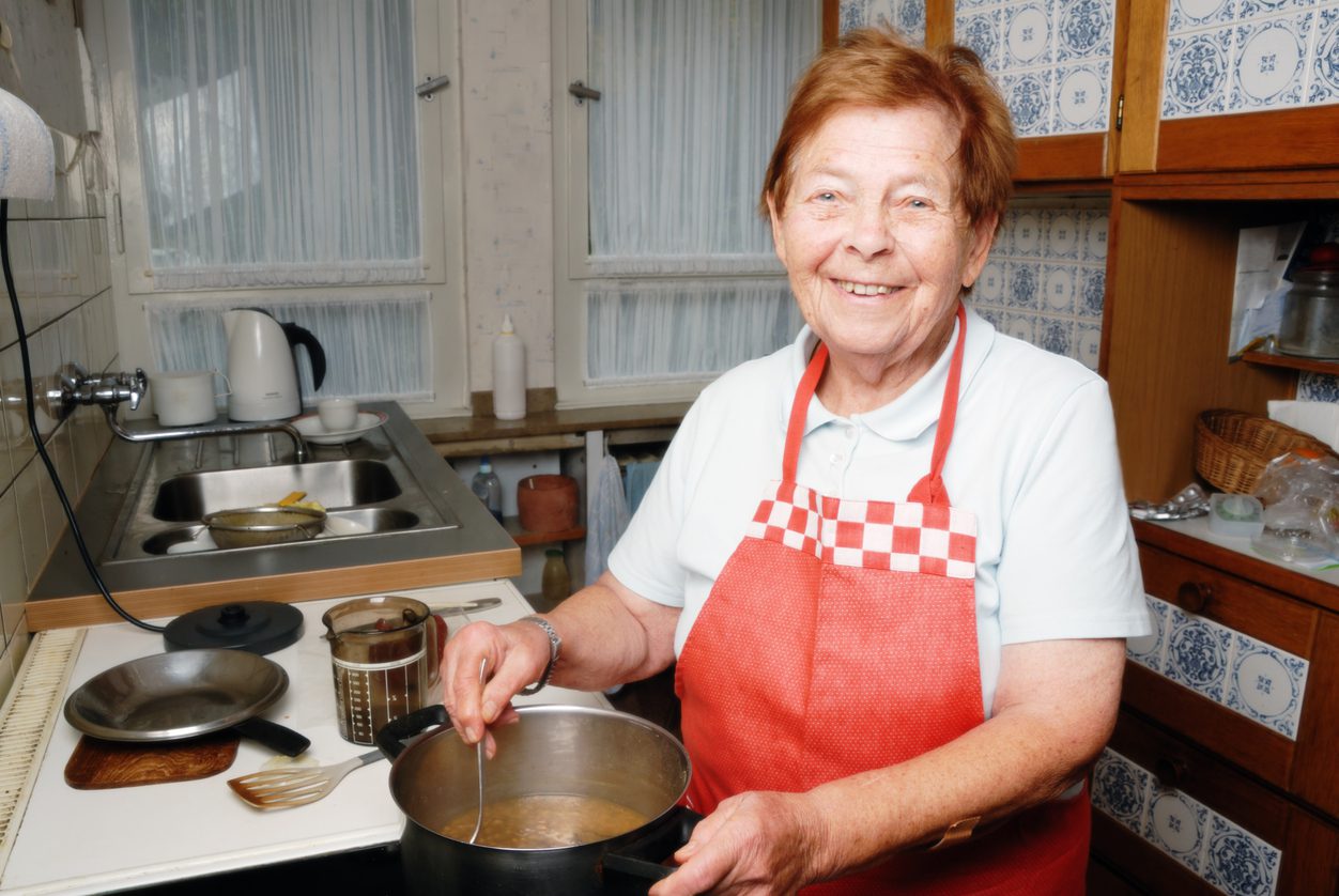 senior woman cooking