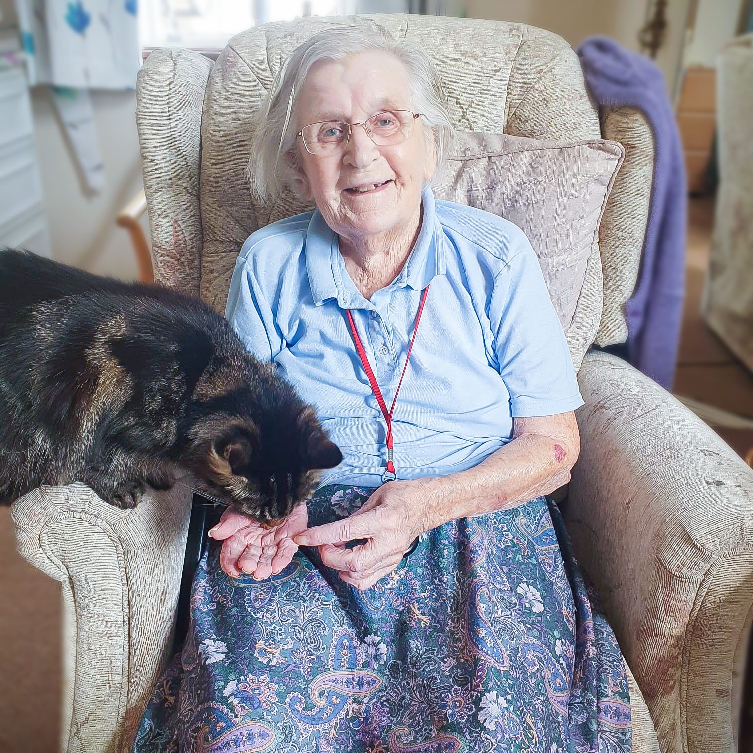 Muriel and Twinkle the cat on Muriel's 95th birthday