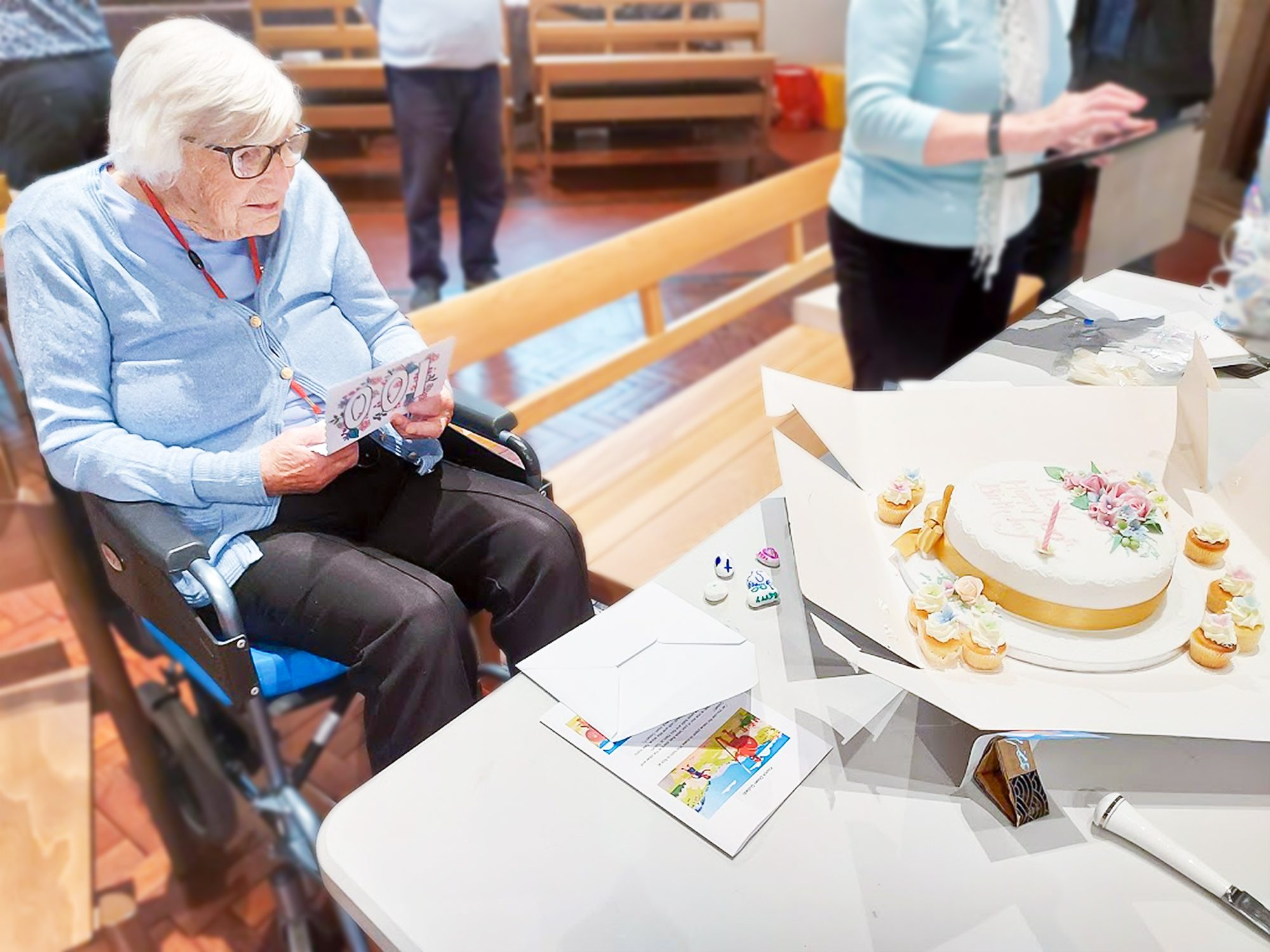 Alton resident Betty Marlow with cake and cards on her 100th birthday.