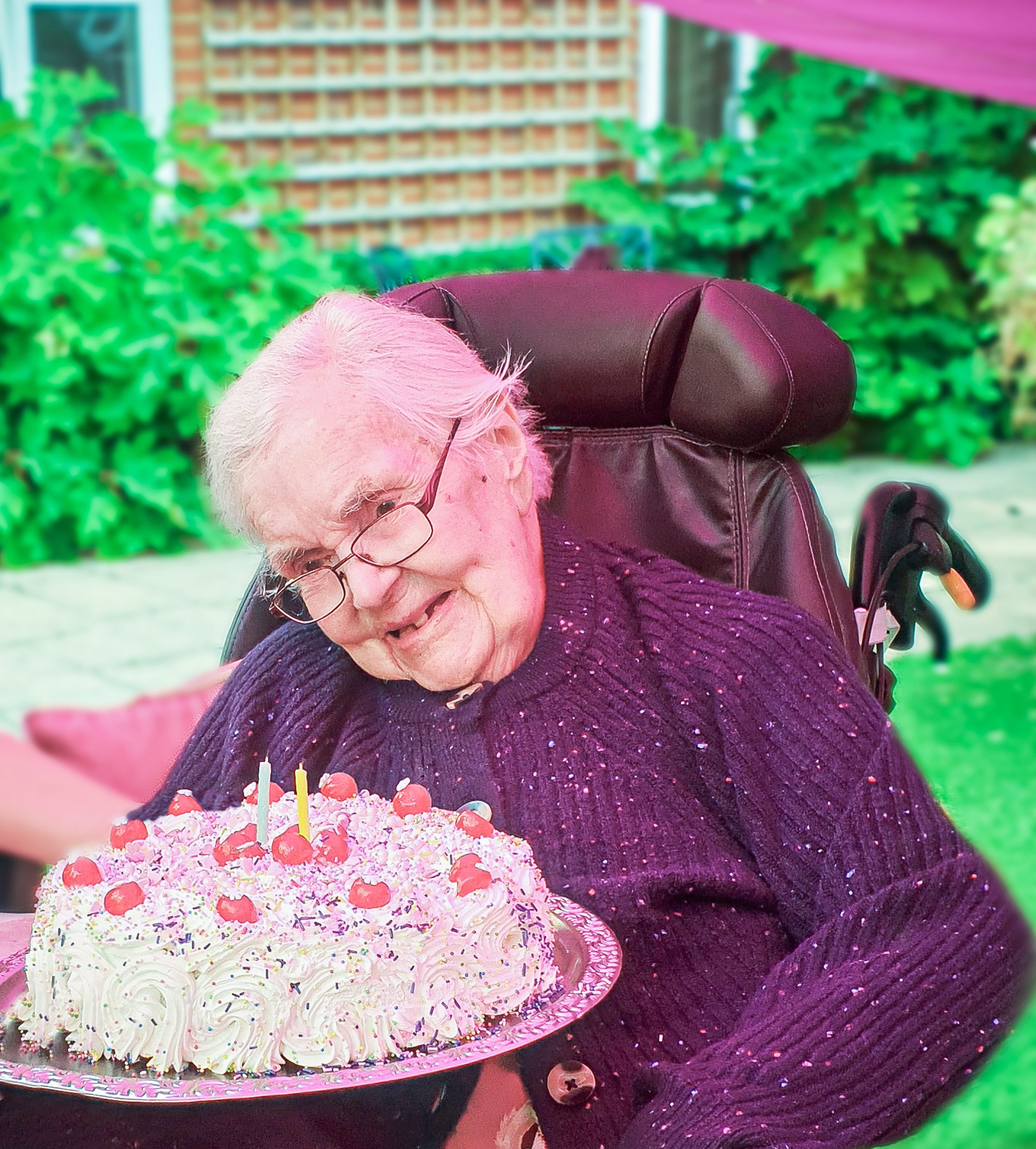 Moyra Webber on her milestone birthday with the birthday cake.