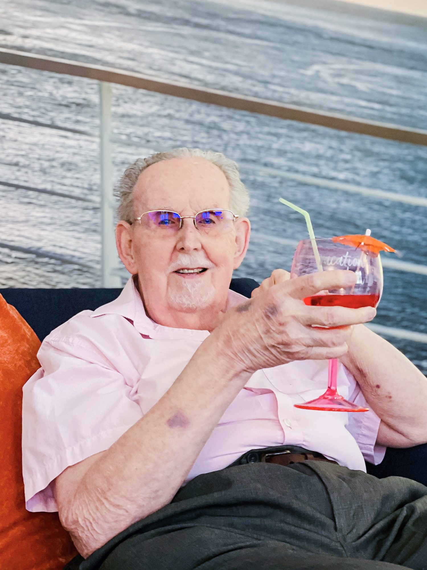 A Bernard Sunley care home resident enjoying a cocktail.