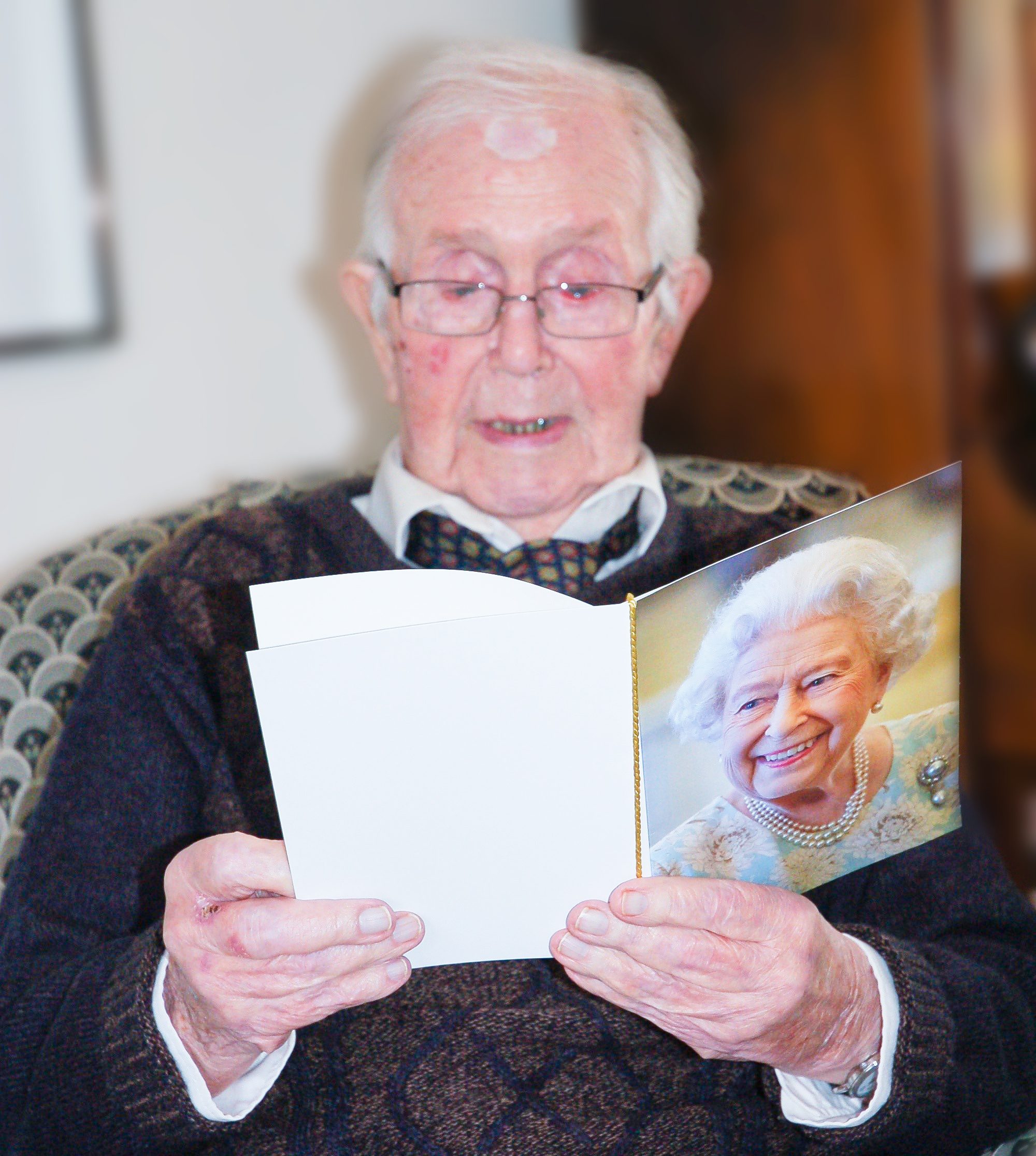 Queen's card being opened by Donald on his Birthday 
