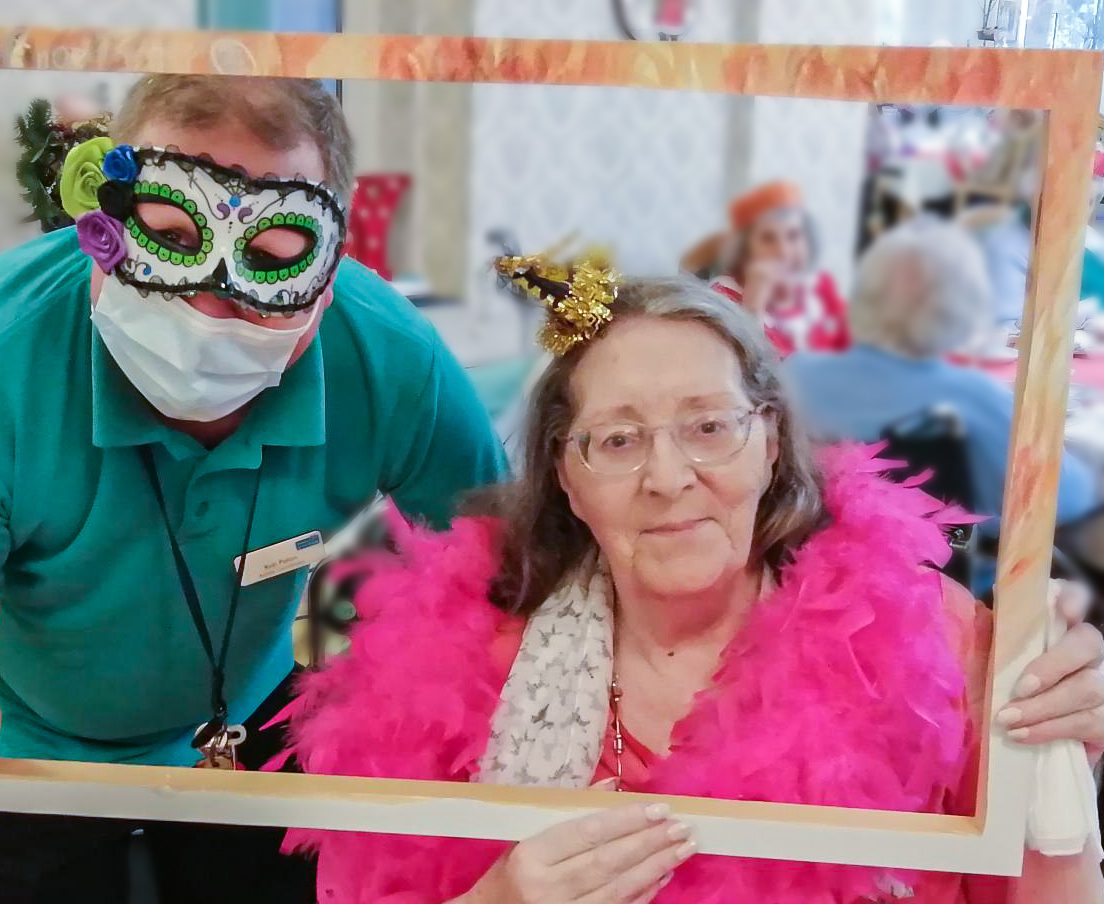 Rob Paton dressed up with a resident for their New Years Eve Gala.
