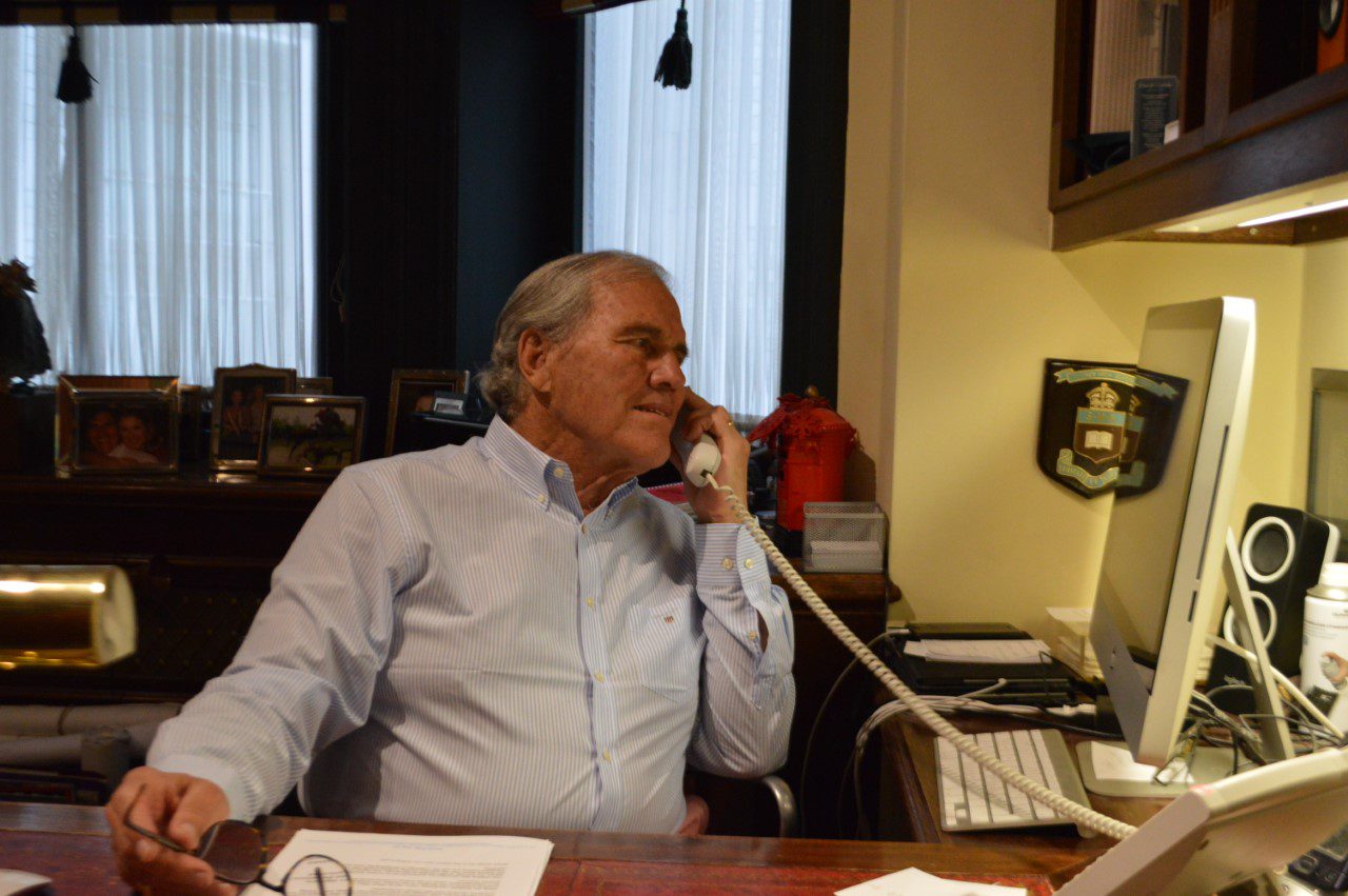 Kerry Rubie, who was recently awarded an MBE, talking on the phone. 