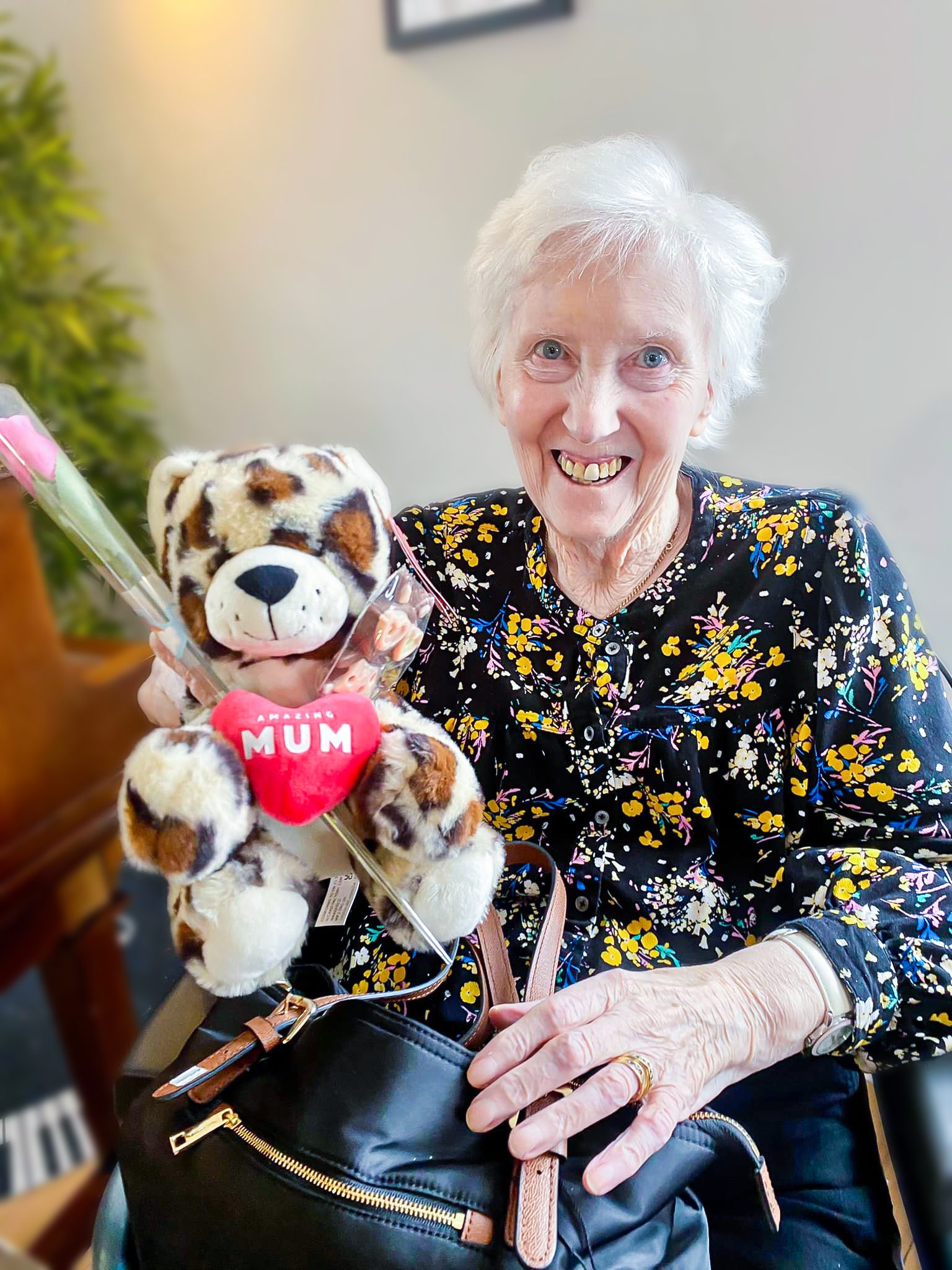 March highlights: A Bernard Sunley resident holding a Mother's Day gift