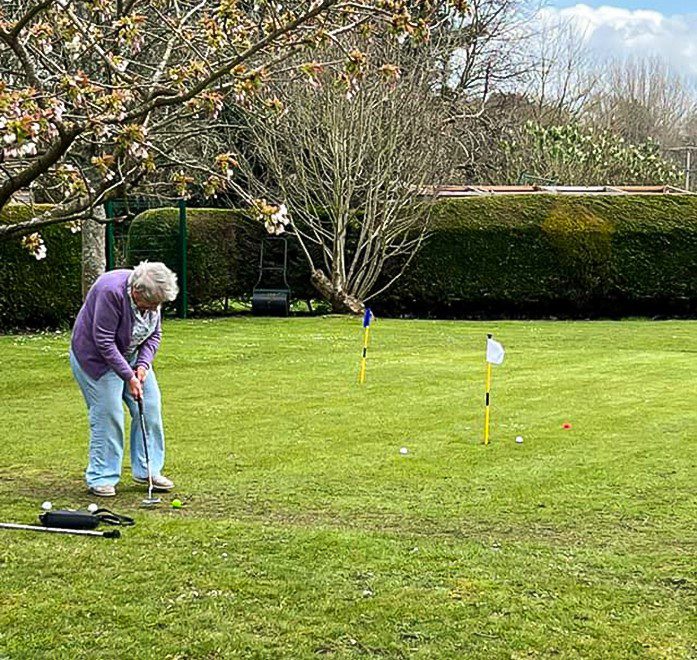 April highlights - Vera playing golf