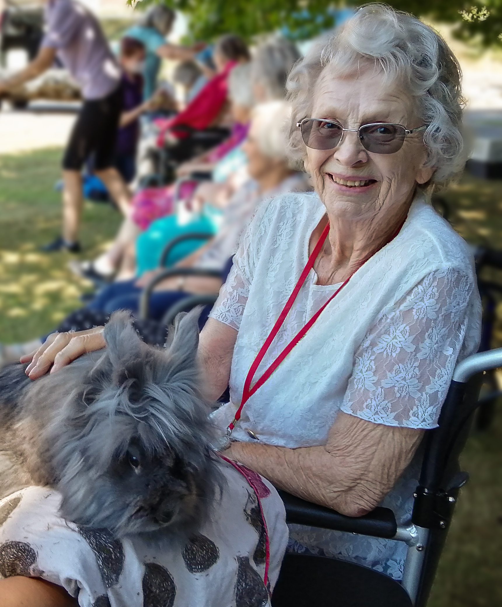 RNNH Resident with a rabbit from Creature Teachers on her lap