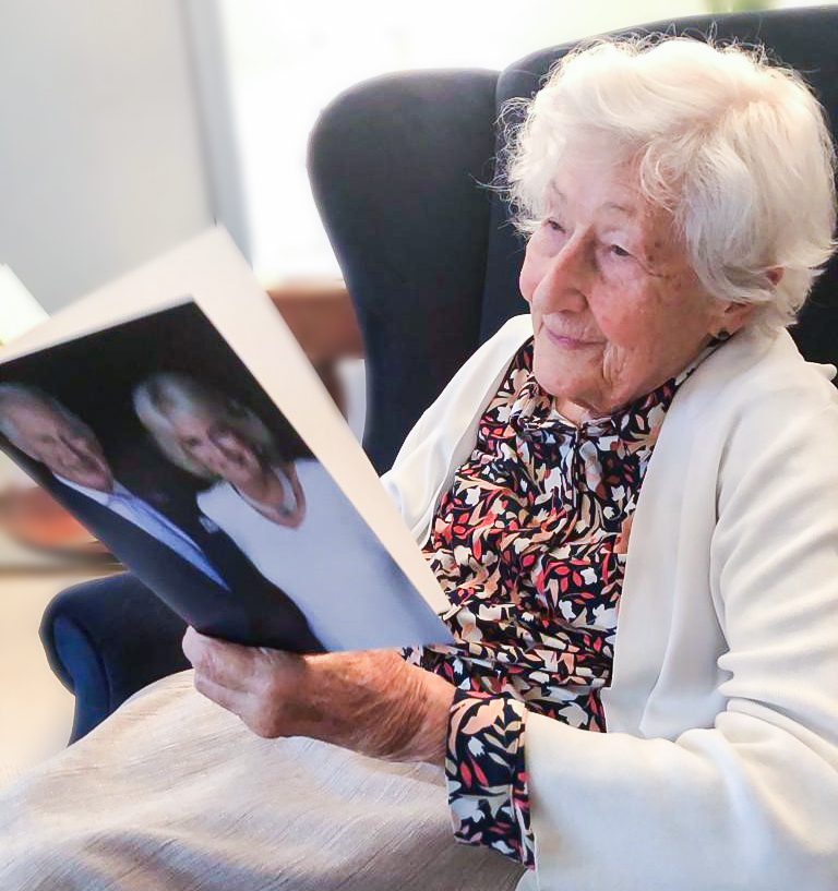 Juliet reading her birthday card from King Charles III