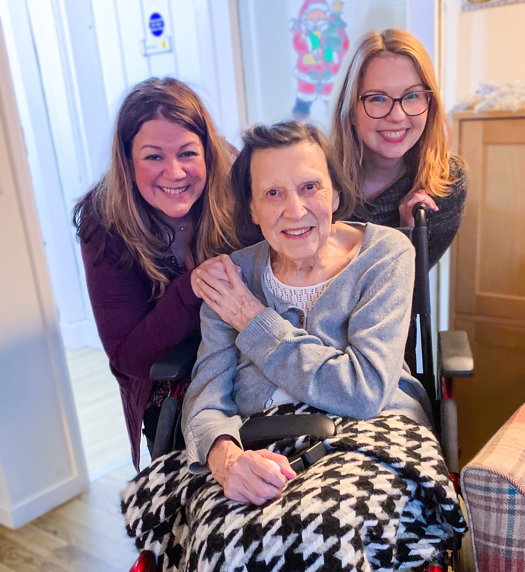 Blanche with her granddaughters on her birthday.