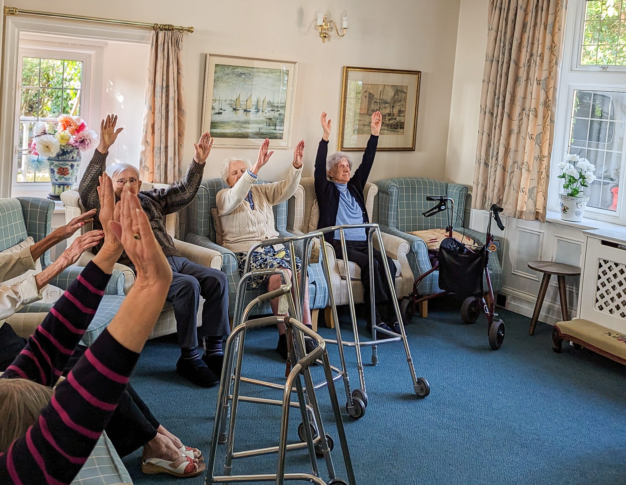 Redcot care home residents taking part in an exercise activity. 