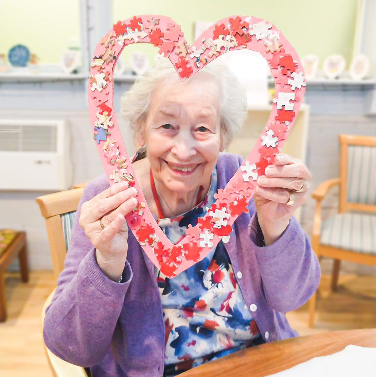 A resident showing off her hand-made craft. 