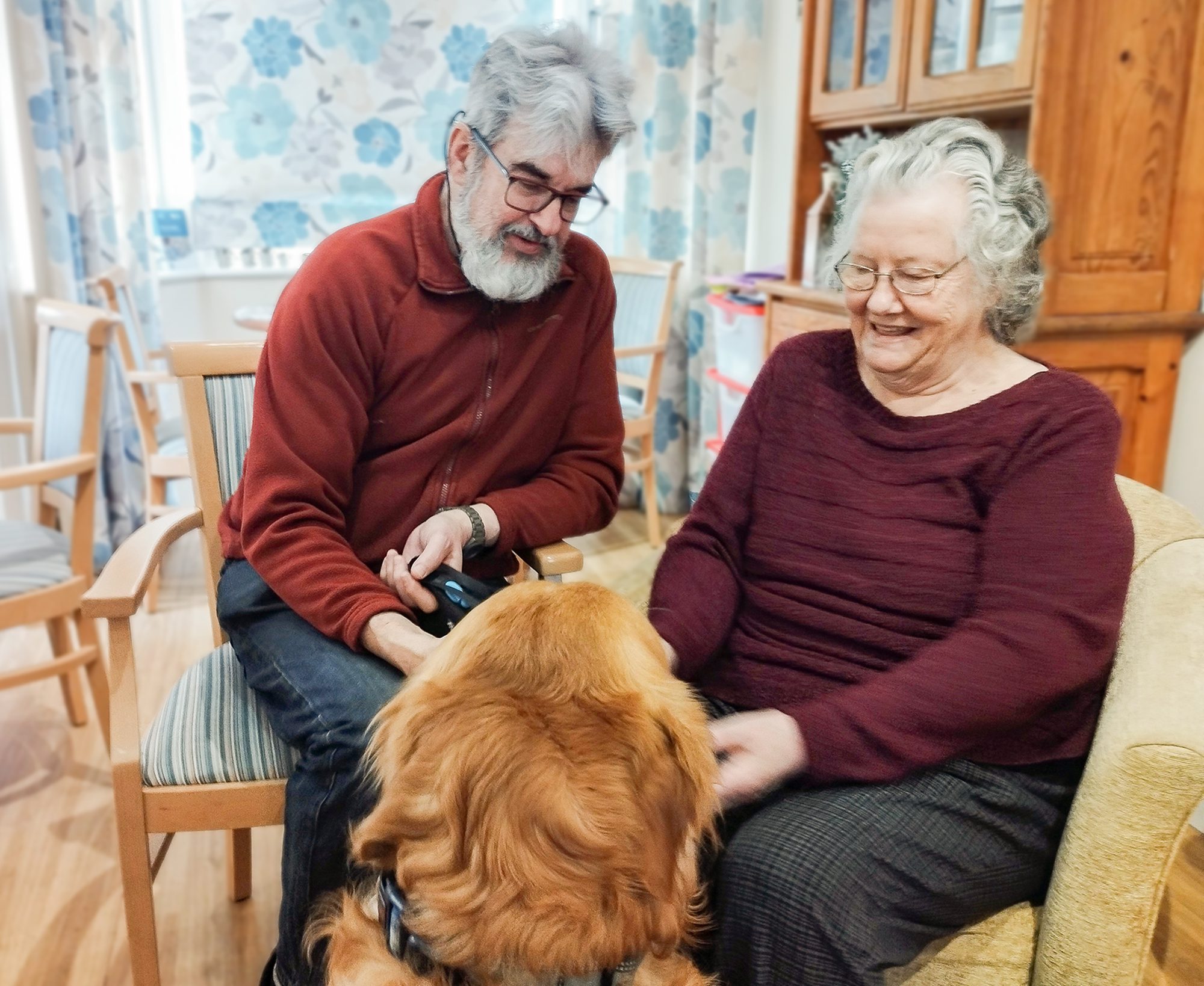 Monty and his owner with a Malvern Day Care client