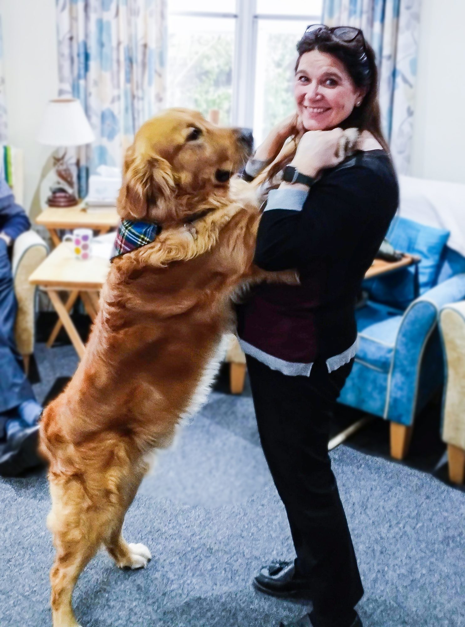 Monty the dog dancing with Shirley Bradley