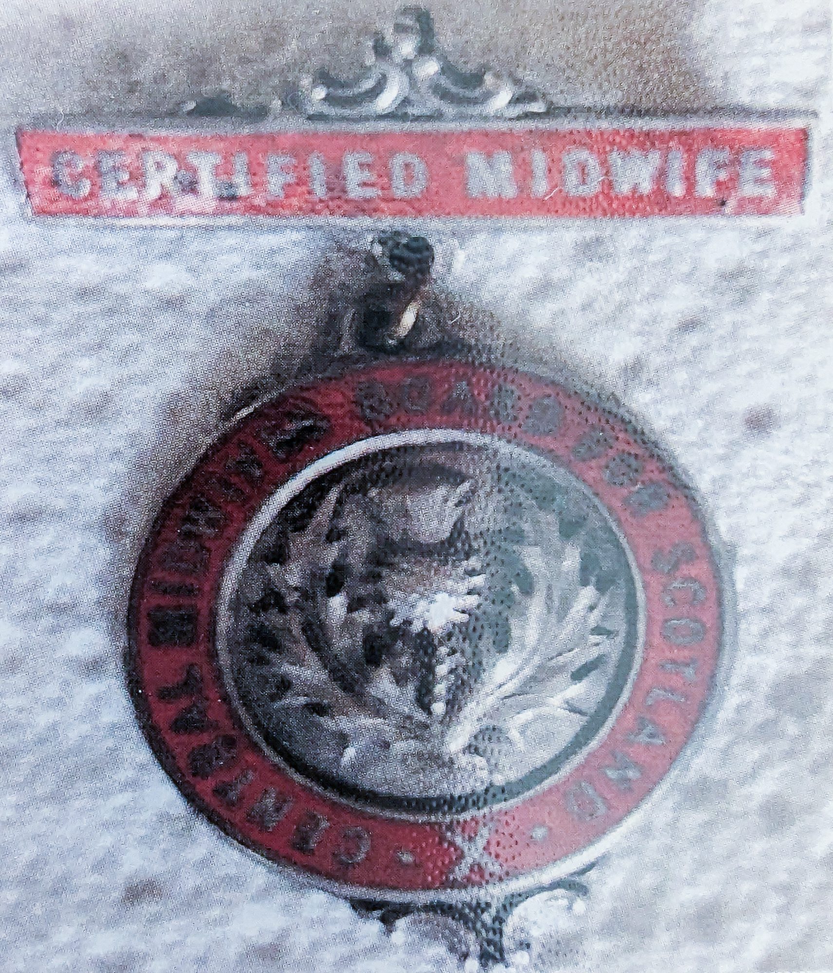 Josephine's certified midwife badge