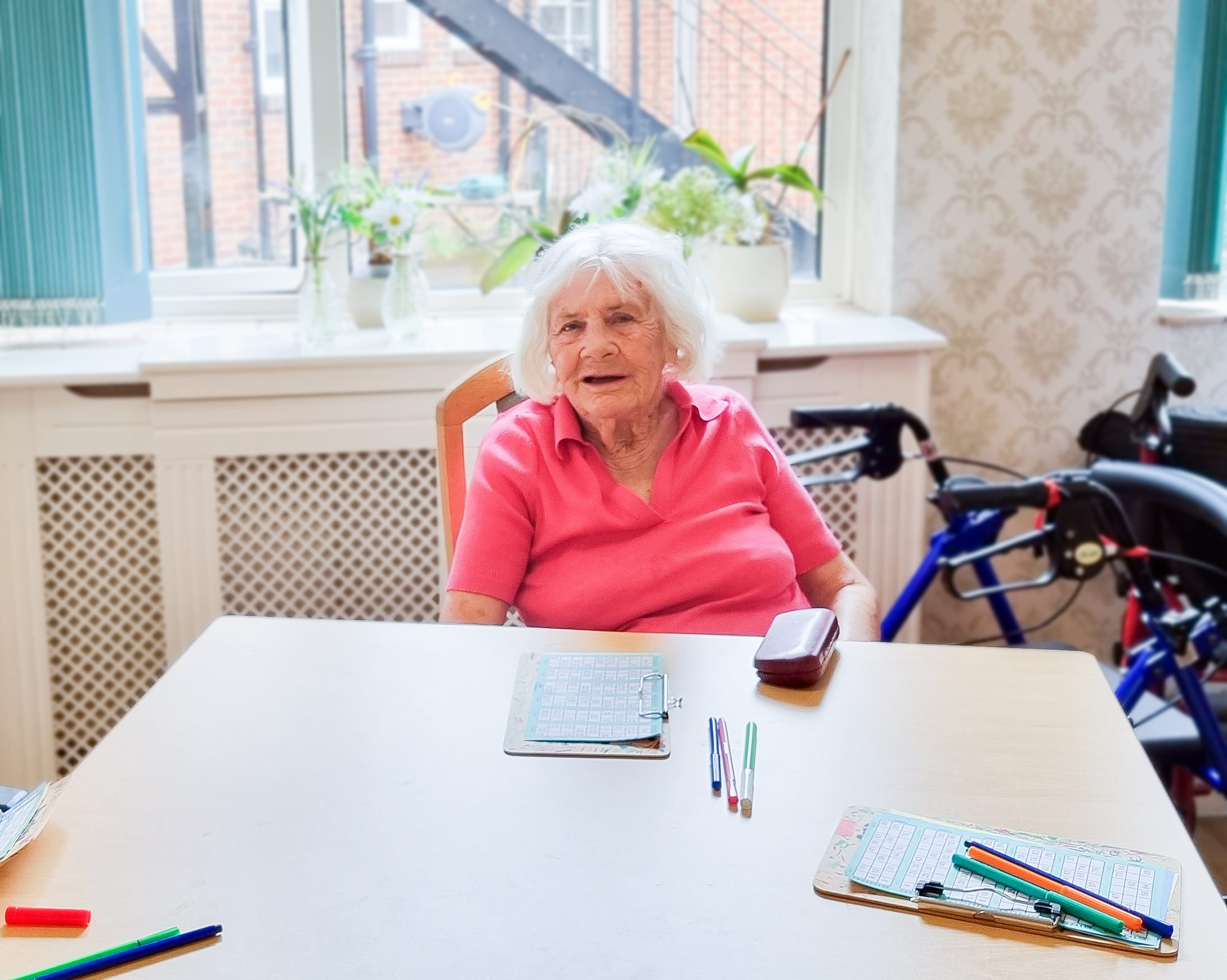 An RNNH care home resident playing bingo.