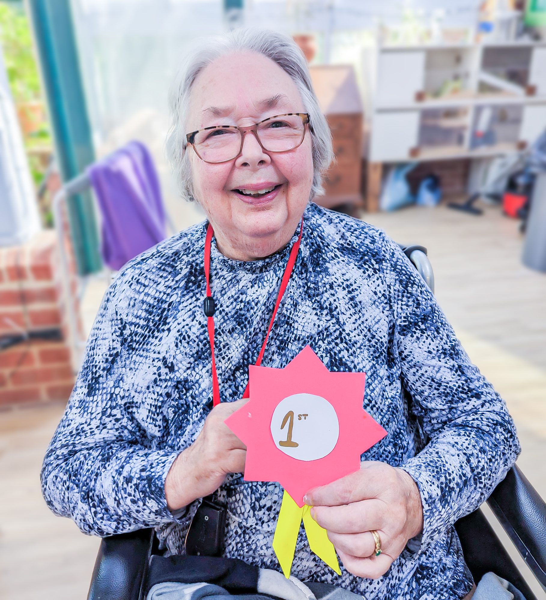 A resident making a rosette ahead of the dog show. 