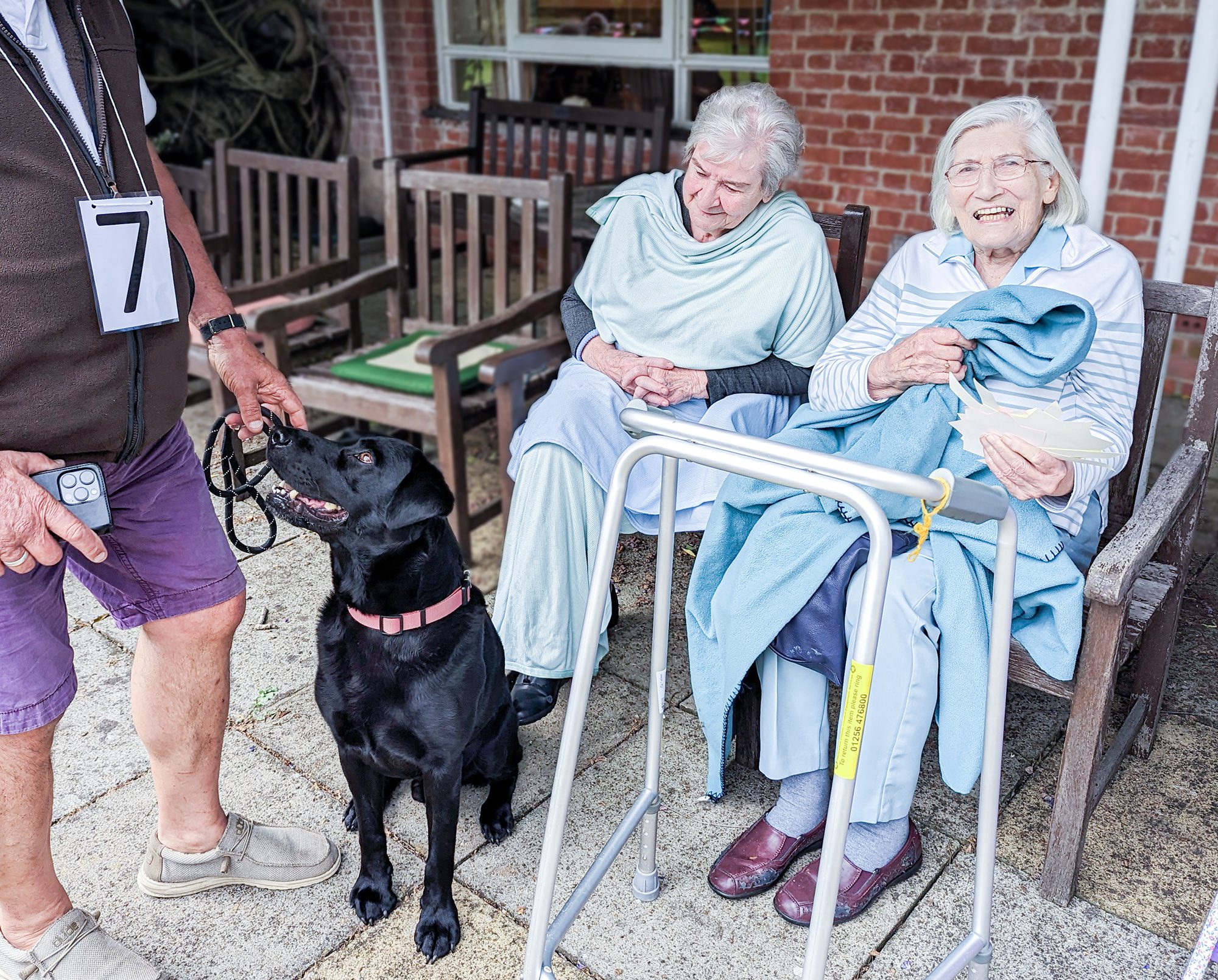 Residents saying hello to one of the dogs.