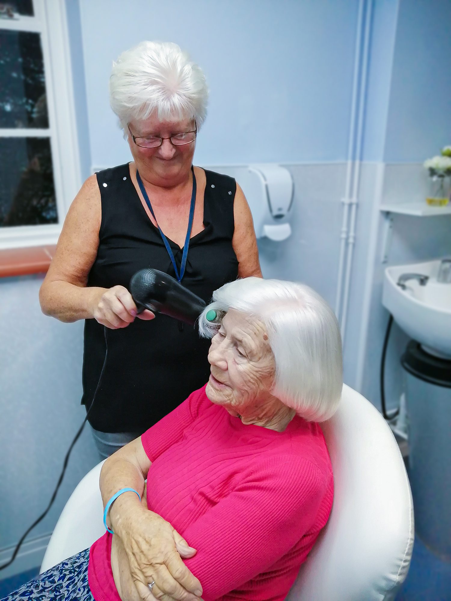 Barbara getting her hair done at our Bournemouth care home.