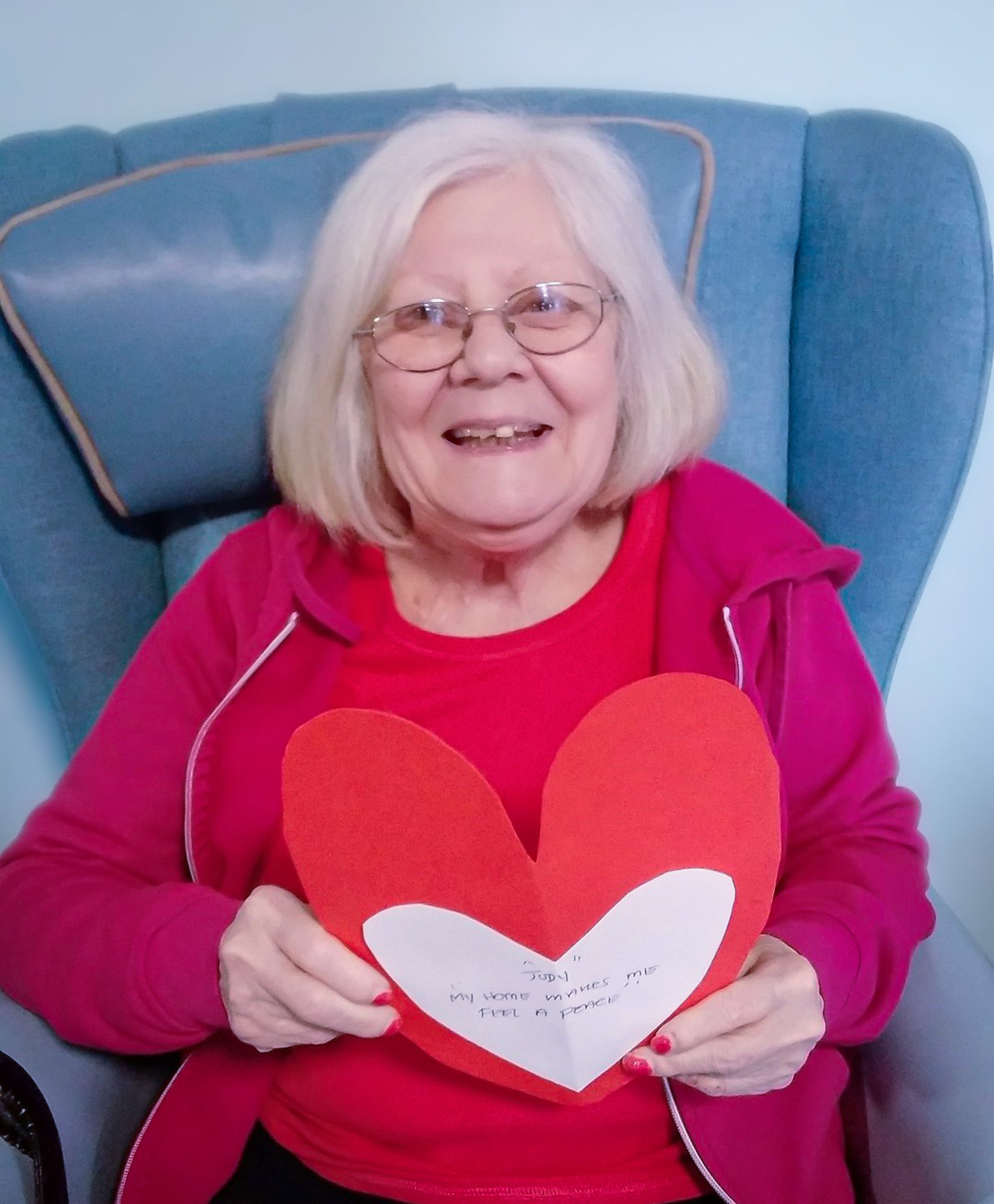 A Coulsdon care home resident holding her heart. 