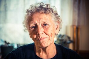 Stock image of an older woman - grants 2024