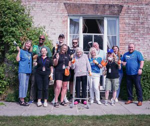 Access Volunteering Team and Friends of the Elderly staff with resident Margaret Hampshire