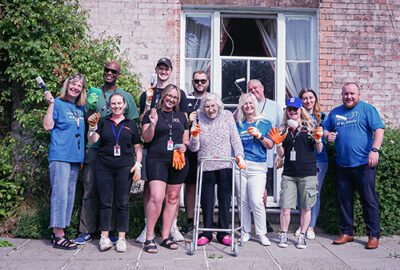 Access Volunteering Team and Friends of the Elderly staff with resident Margaret Hampshire